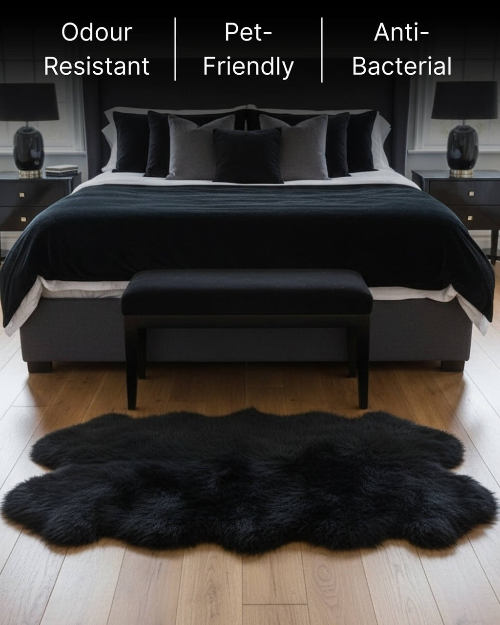 Black Quad Long Sheepskin Rug in front of bed