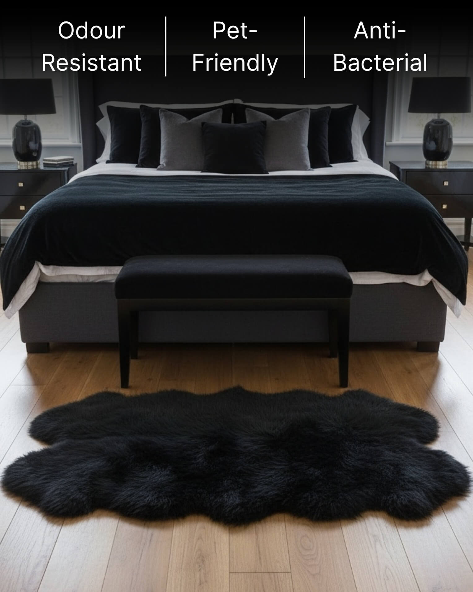 Black Quad Long Sheepskin Rug in front of bed