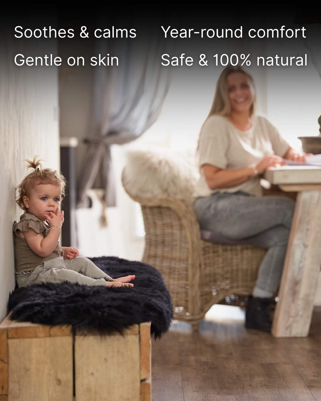baby sitting on Black Double Long Wool Sheepskin Rug 