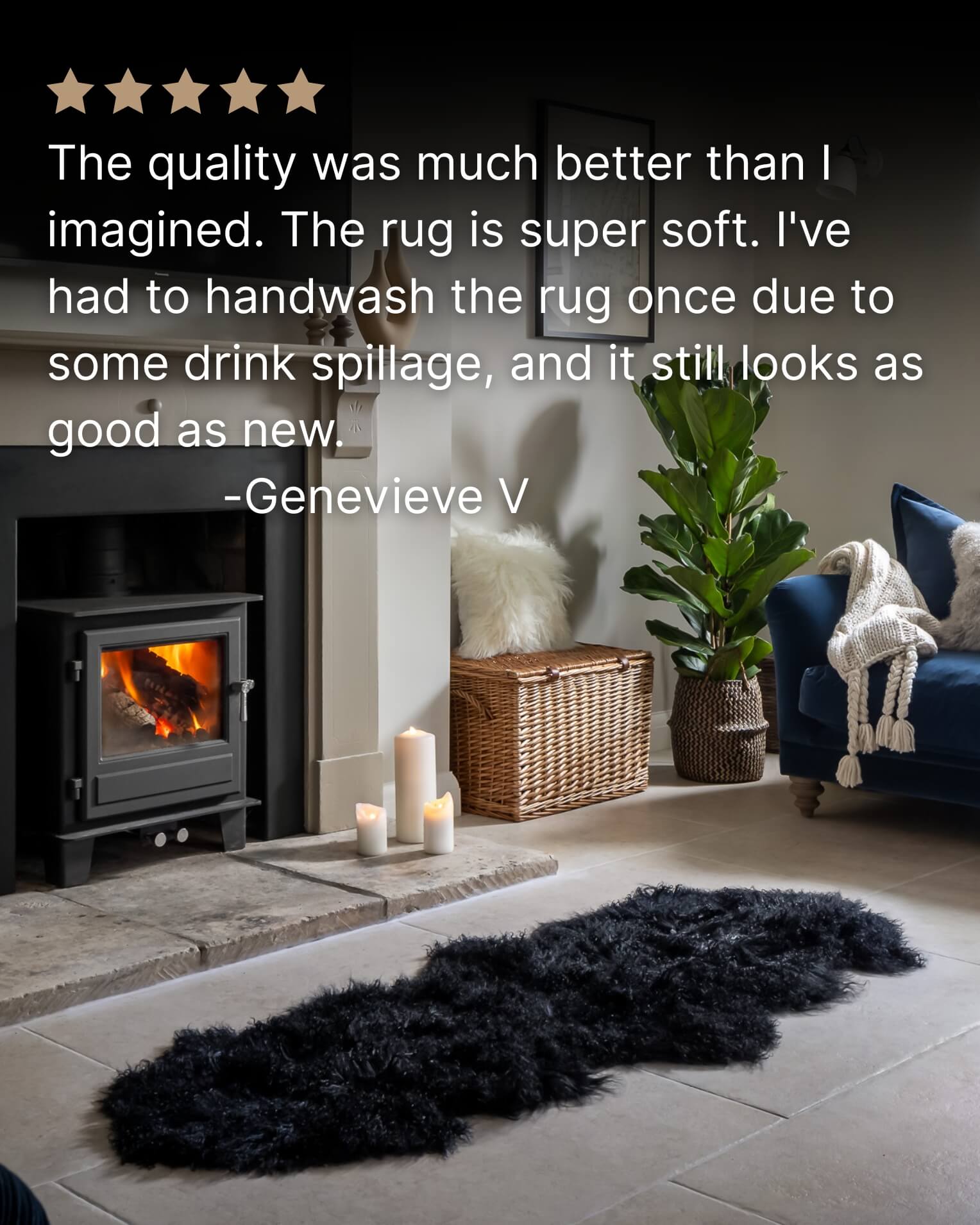 Black Mongolian Sheepskin Rug in front of fireplace