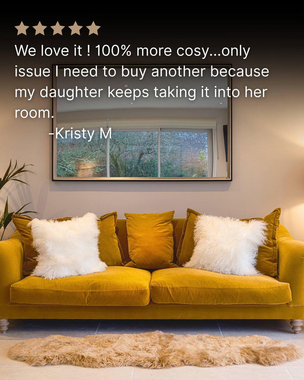 Bronze Double Long Wool Sheepskin Rug in front off yellow sofa