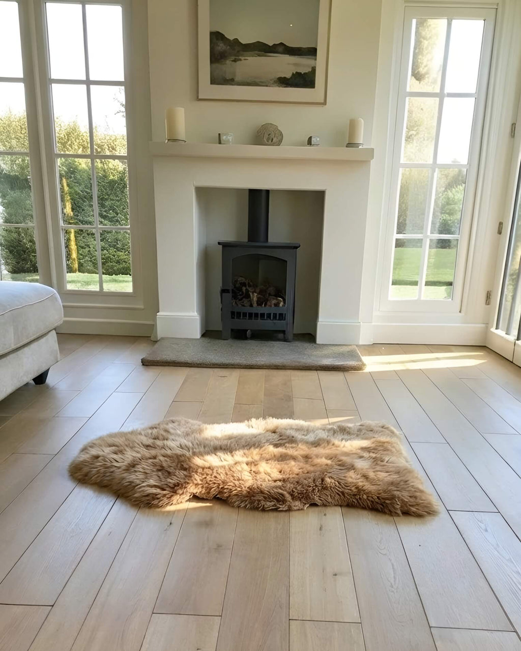 Mocha Single Sheepskin rug in front off fireplace