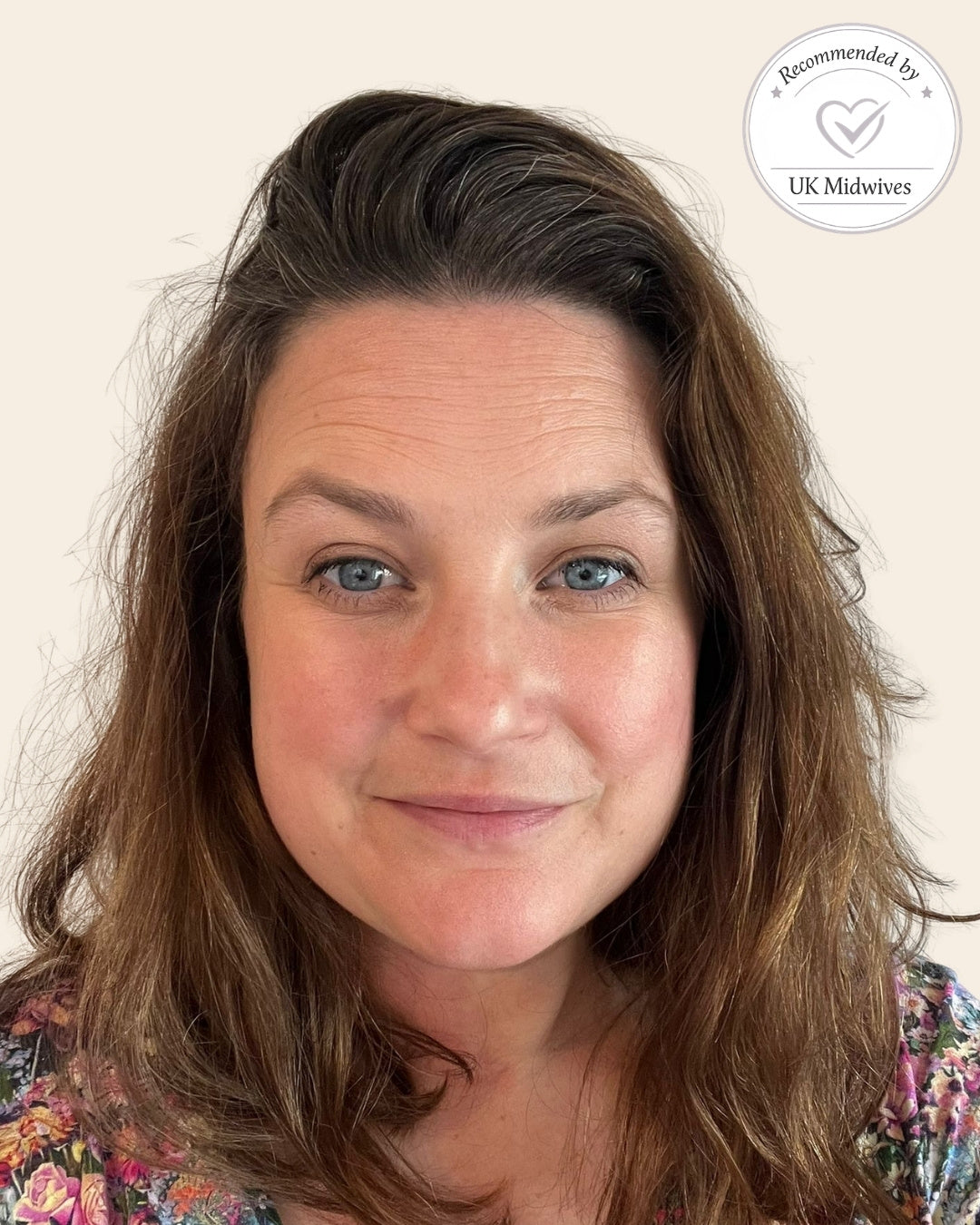 A close-up portrait of a midwife