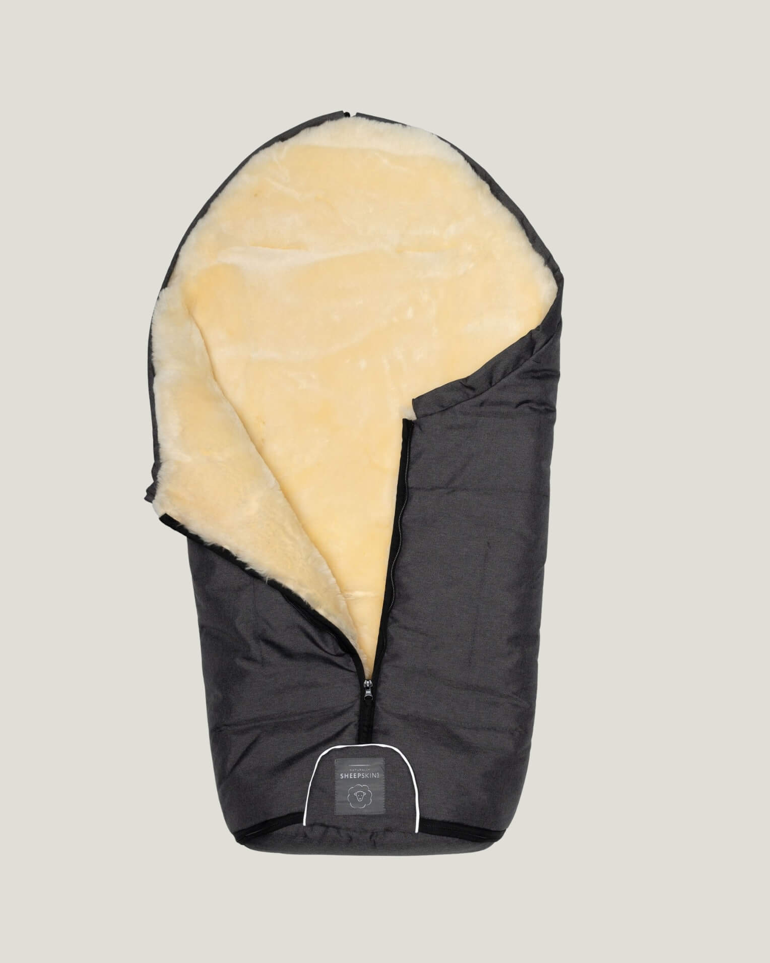 Black baby footmuff half zipped up