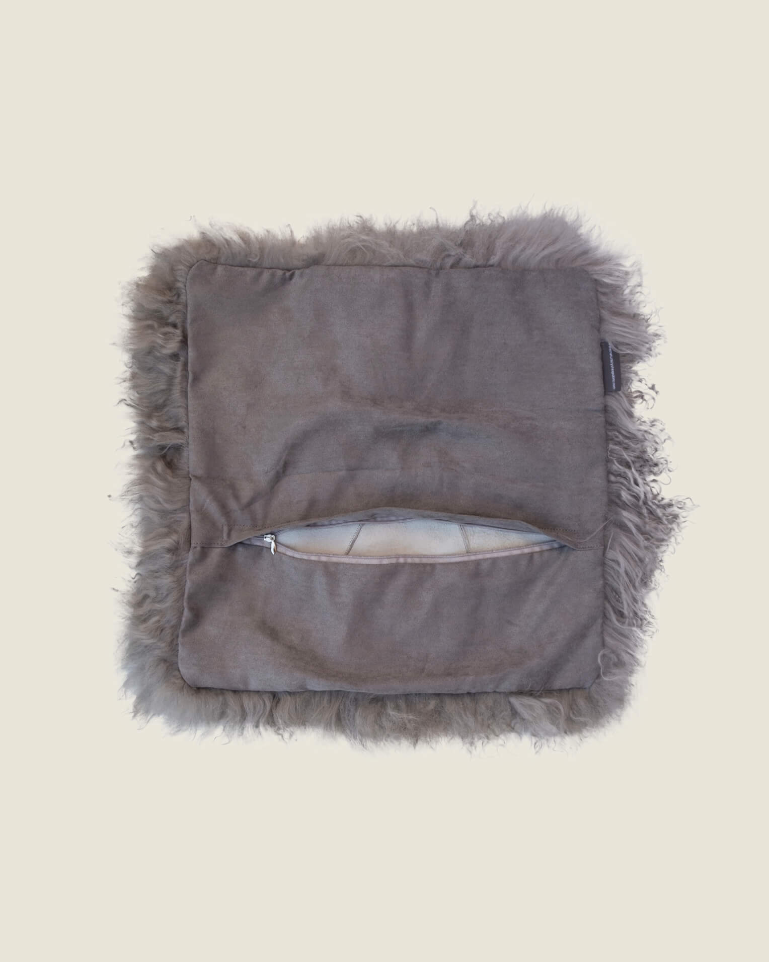 Grey mongolian sheepskin pillow back