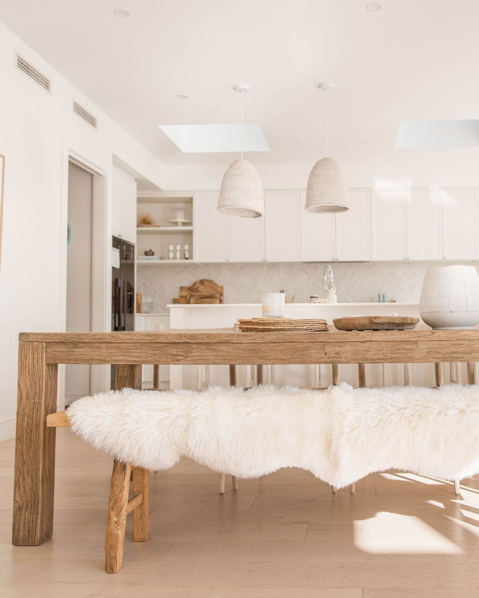 White Quad Long Sheepskin Rug on bench in kitchen