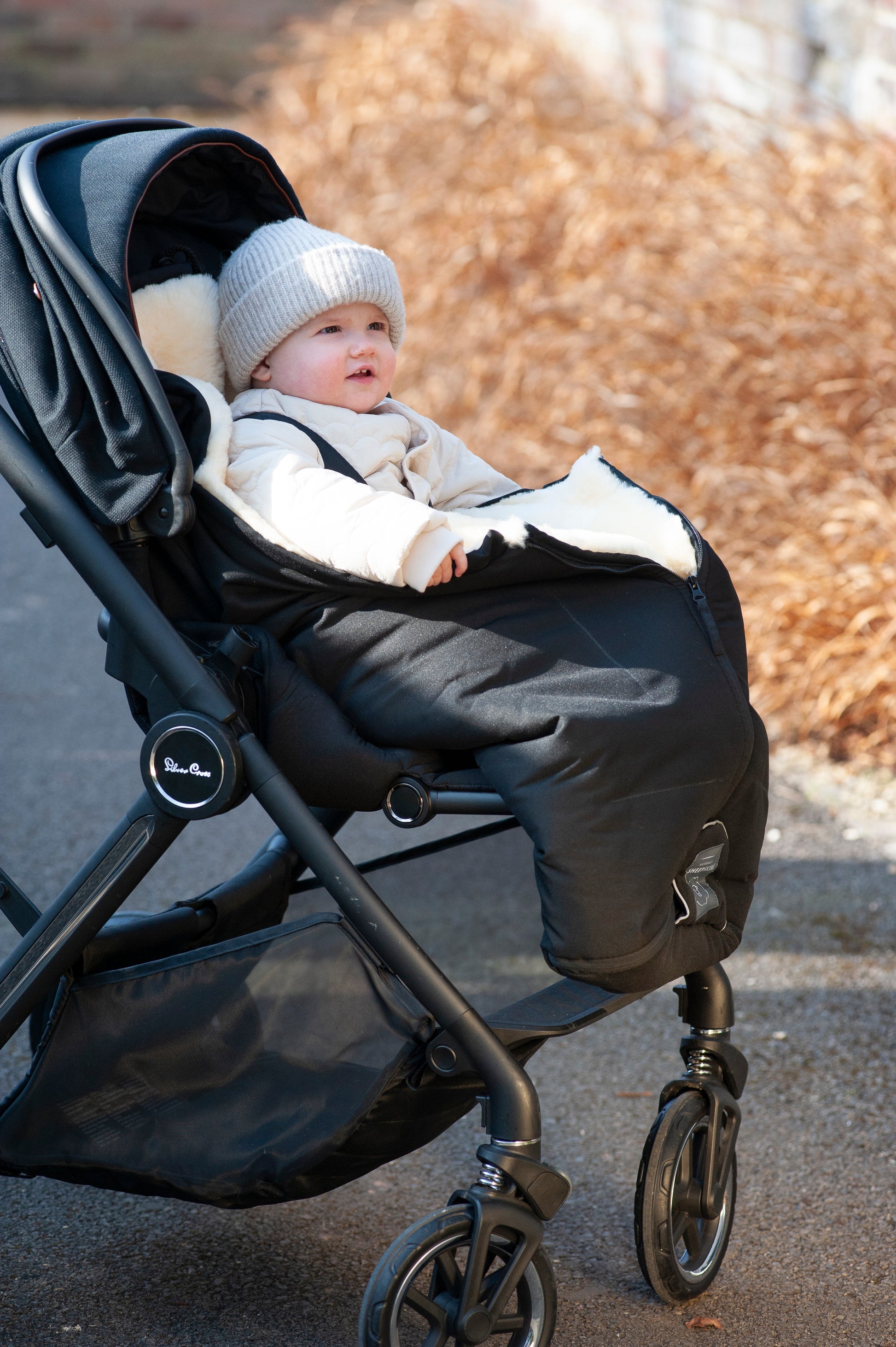 Merino sheepskin baby footmuff black