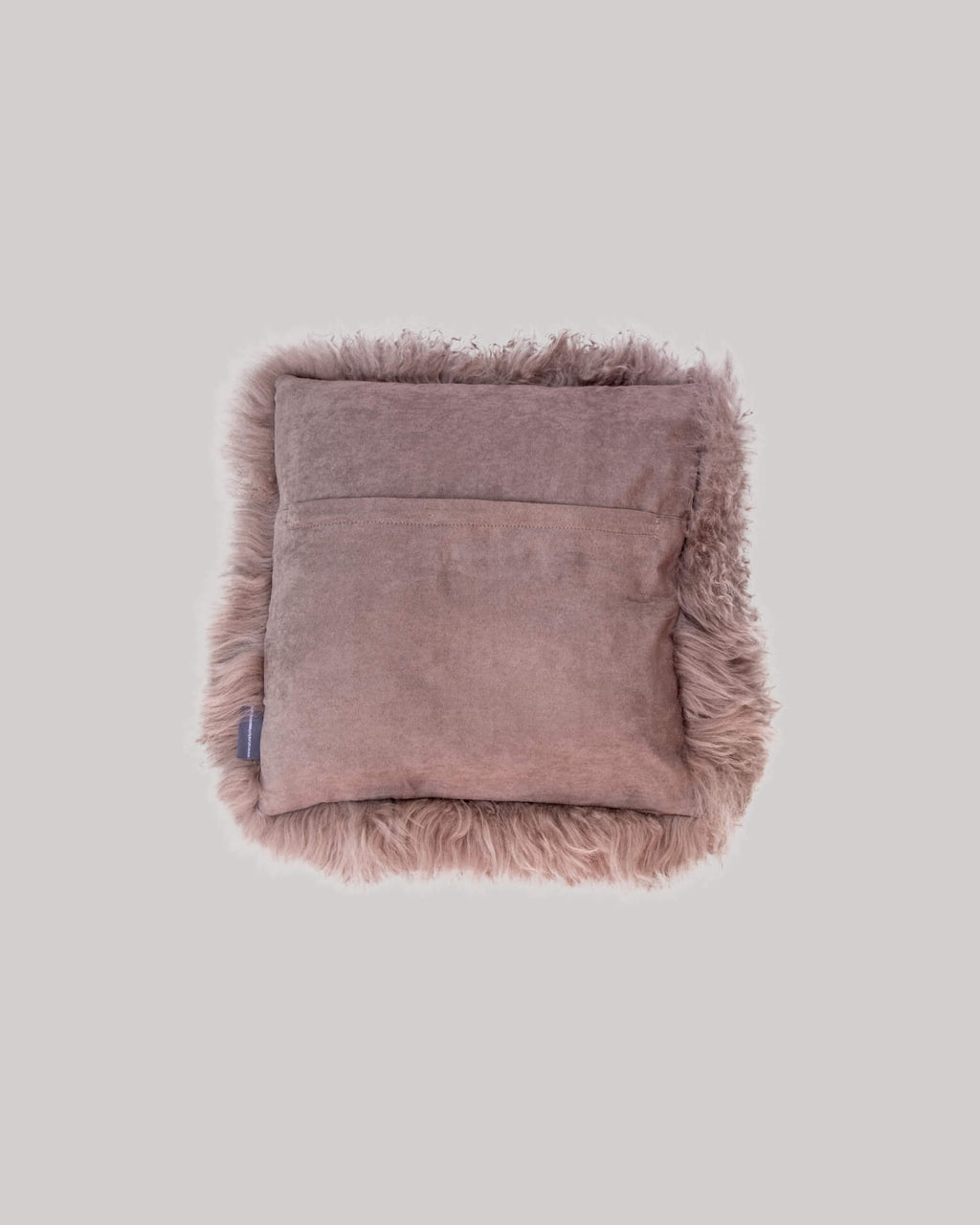 Mocha mongolian sheepskin pillow back