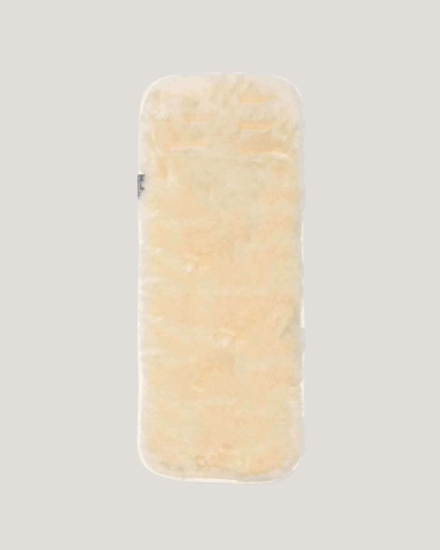 Natural sheepskins pram liner flay lay