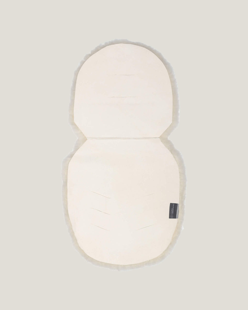 Back detail of sheepskin pram liner