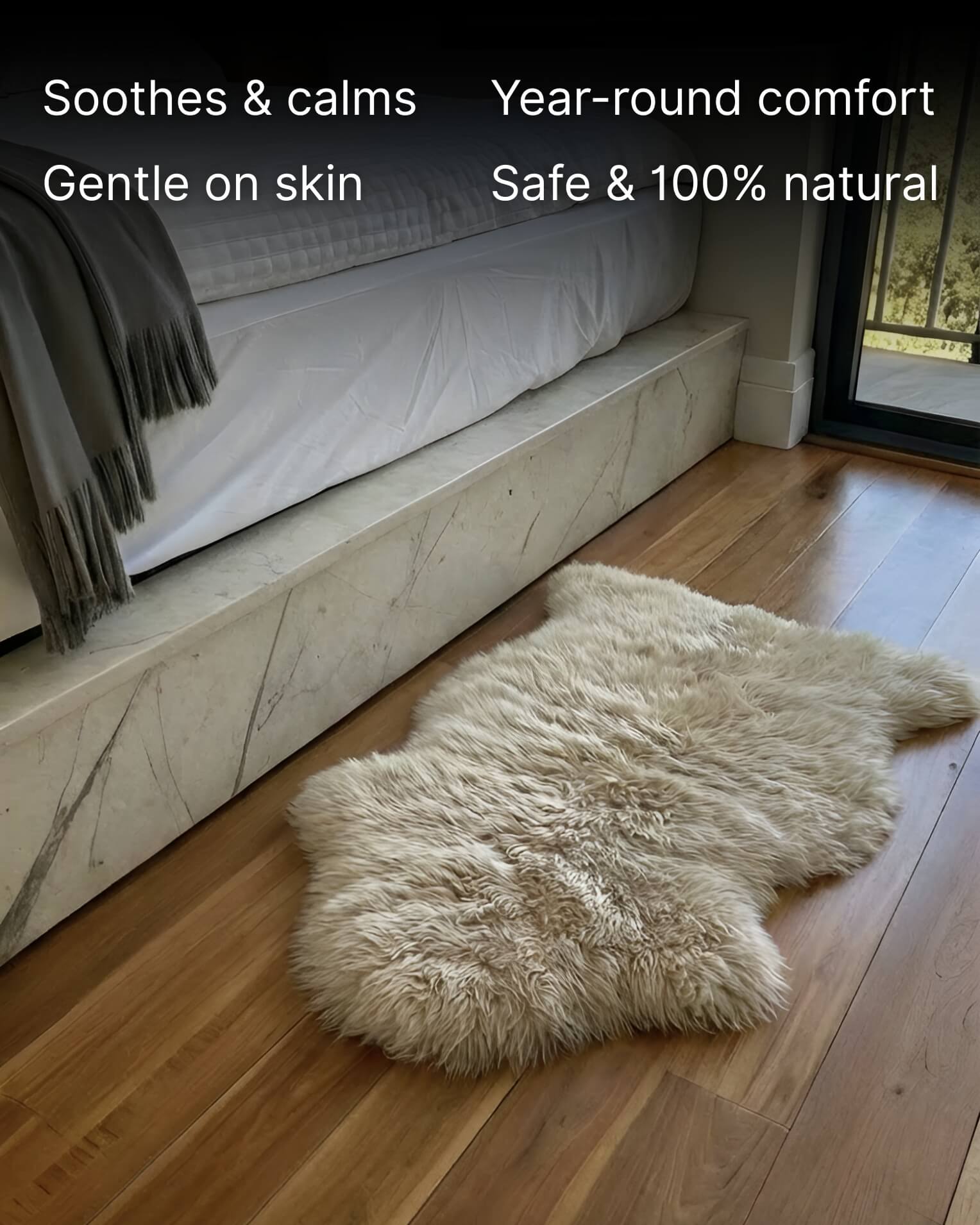 Stone Single Sheepskin rug next to bed