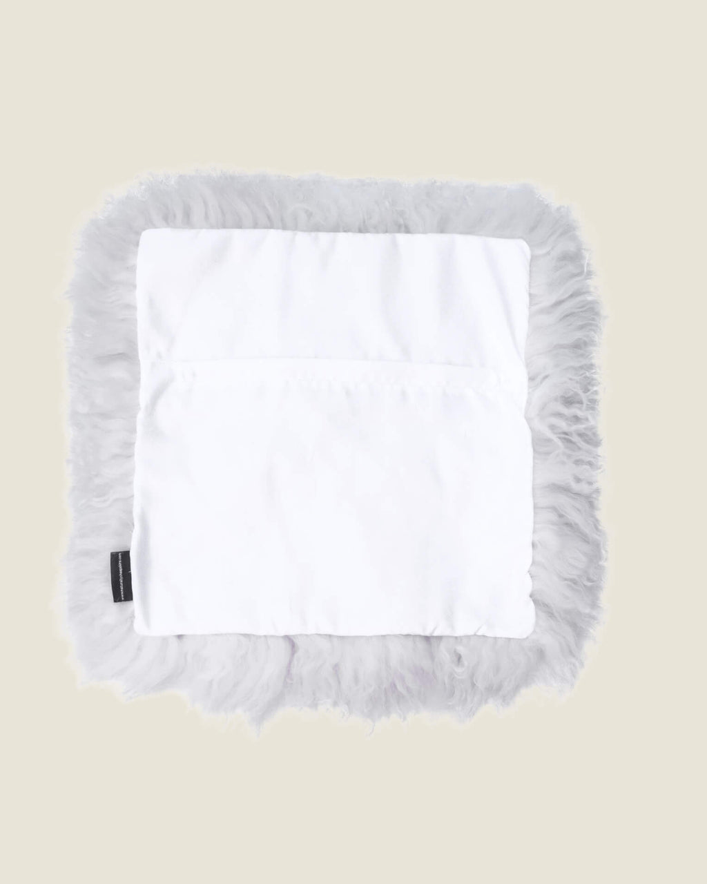 White mongolian sheepskin pillow back