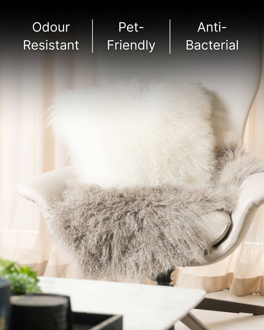 White mongolian sheepskin pillow on single chair