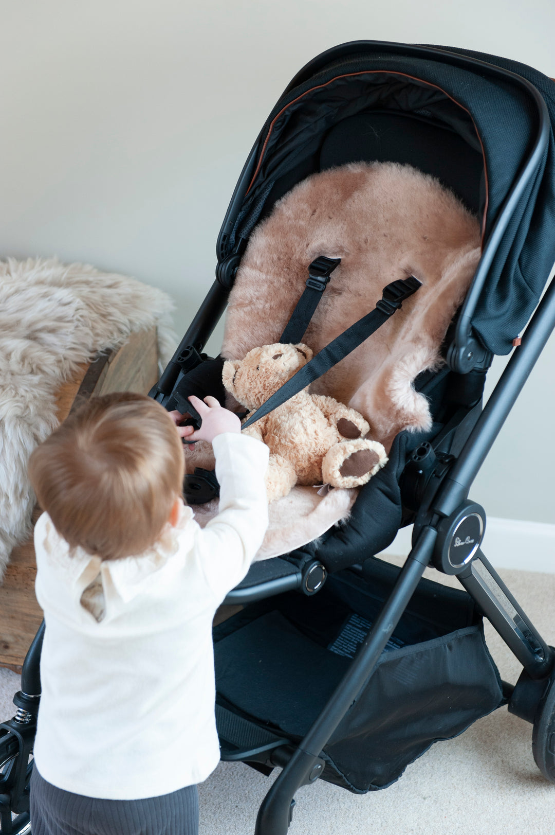 rose gold shorn sheepskin pramliner