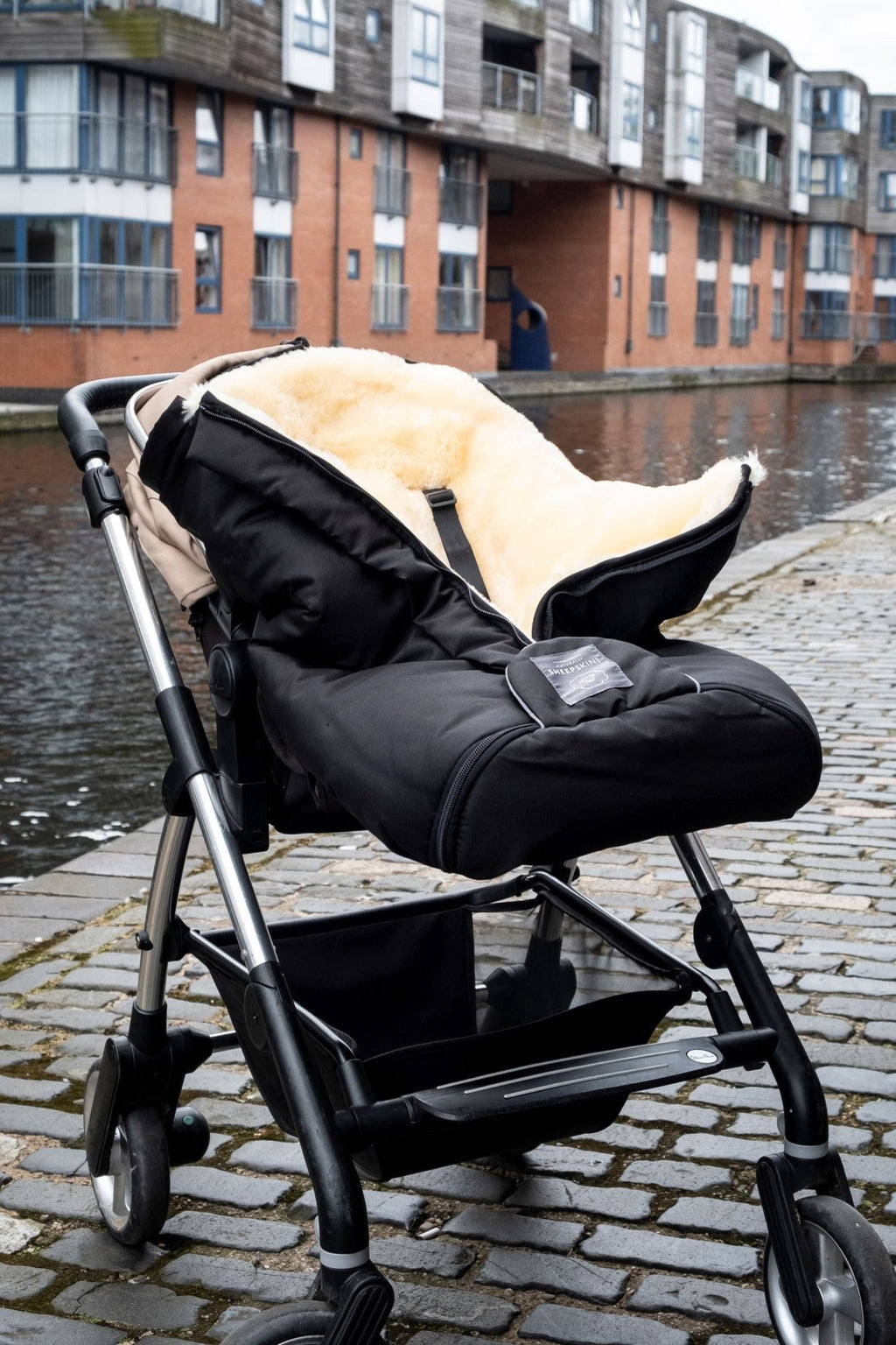 Sheepskin Footmuff Black in Silver Cross pushchair